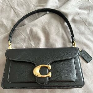 Coach Tabby comes with long crossbody strap. Like new ! Used once !